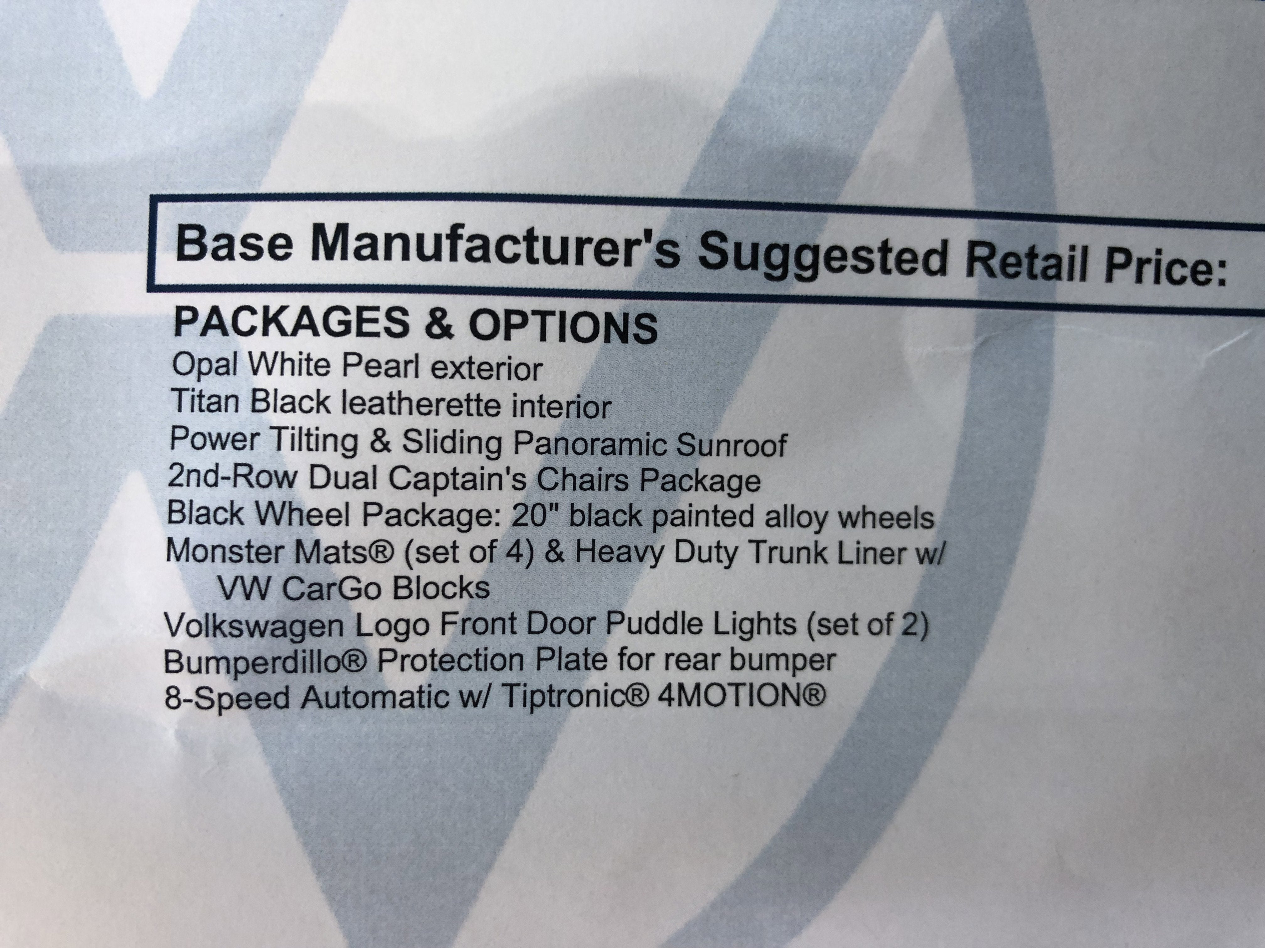 2026 Volkswagen Atlas 2.0T SE w/Technology w/captains chairs, panoramic sunroof and black wheel package