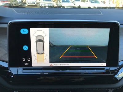 2026 Volkswagen Atlas 2.0T SE w/Technology w/captains chairs, panoramic sunroof and black wheel package