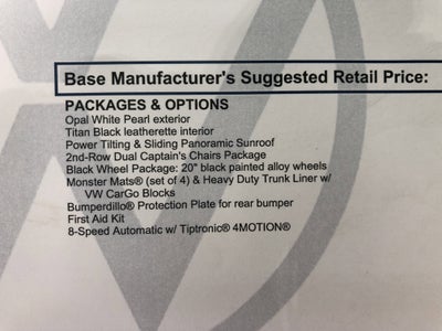 2026 Volkswagen Atlas 2.0T SE w/Technology w/captains chairs, panoramic sunroof and black wheel package