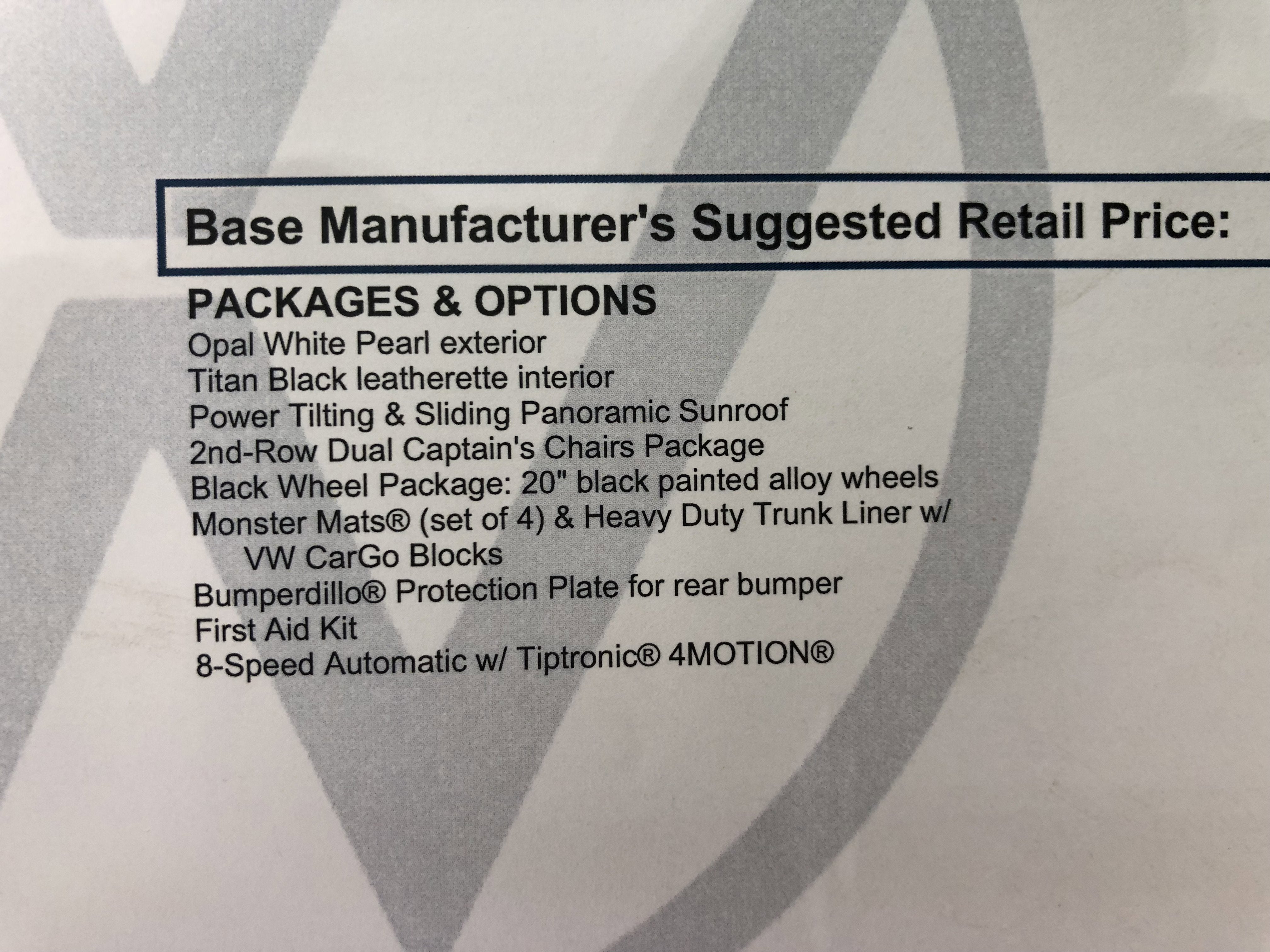 2026 Volkswagen Atlas 2.0T SE w/Technology w/captains chairs, panoramic sunroof and black wheel package